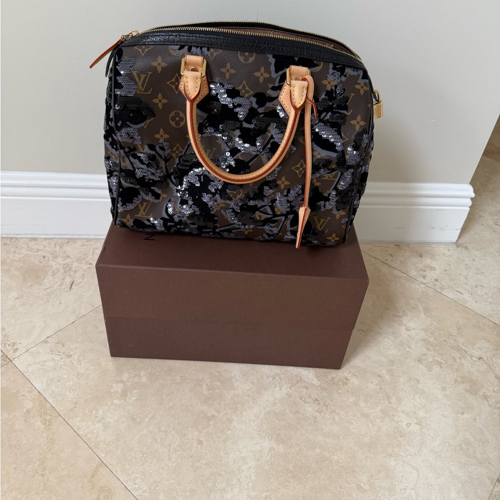 LOUIS VUITTON
Limited Edition Fleur De Jais Speedy 30 Bag